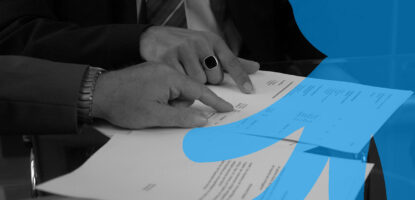Image showing people's hands pointing to something on some documents. Image has a decorative graphic treatment on top of image.