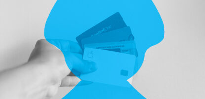 Image showing close up shot of hand holding a few credit cards with decorative graphic overlay on top of image.